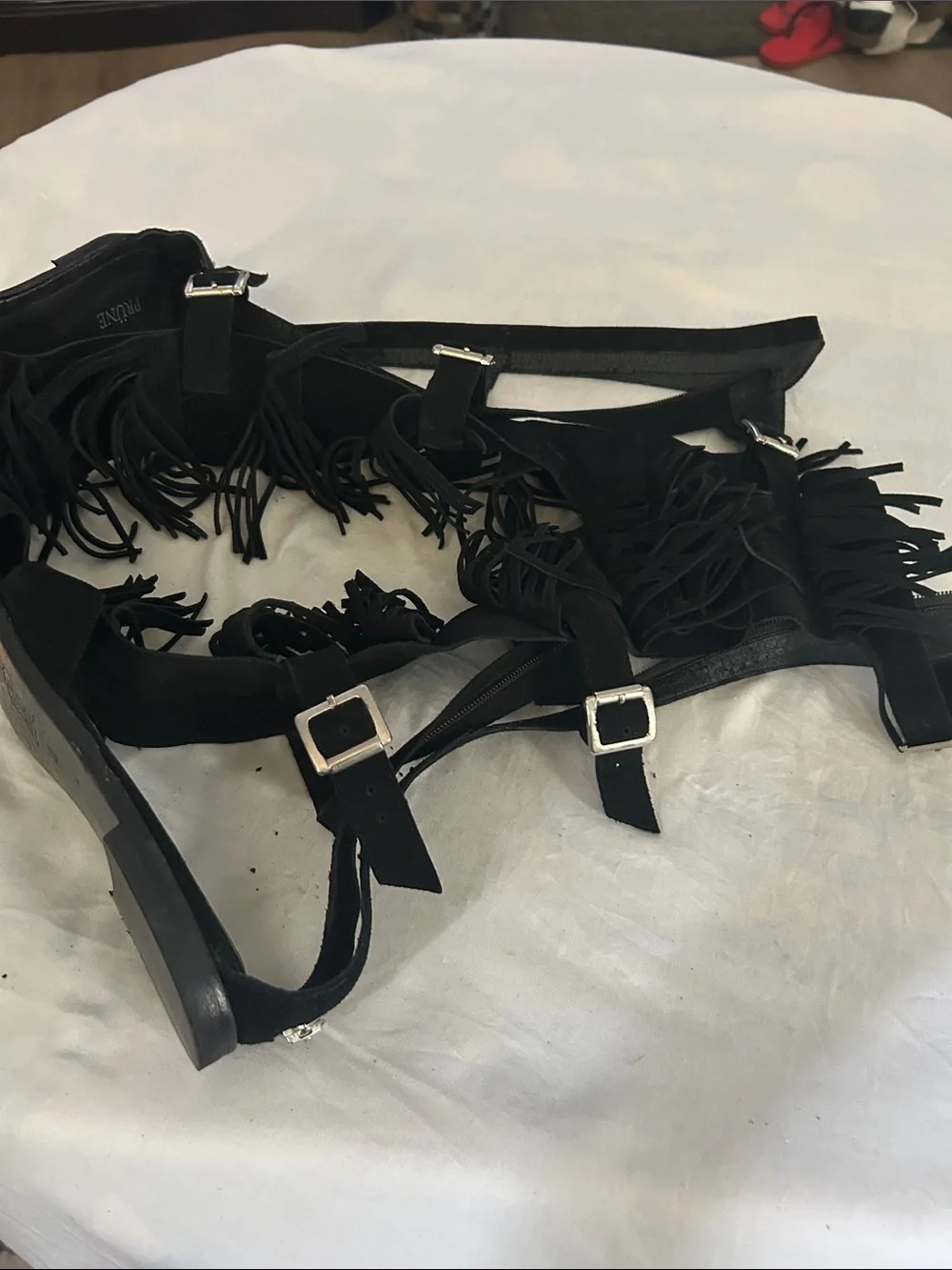 Prune Black Fringe Gladiator Sandals with Buckle Straps